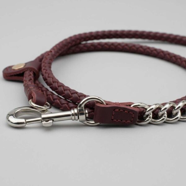 Side view of leather choke leash showing chain and stitching detail
