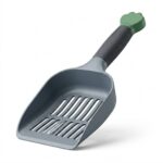 Front view of plastic cat litter scoop on white background