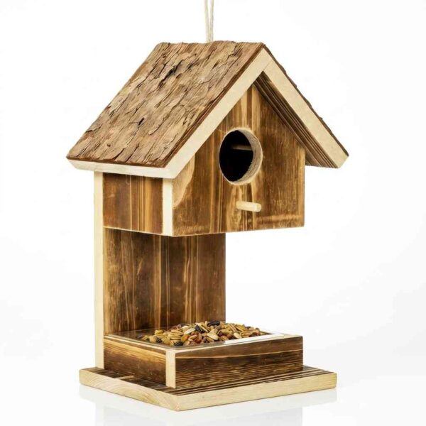 Outdoor wooden birdhouse bird feeder with feeding tray on a white background.