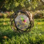 Cat rolling ball toy on grass outdoors