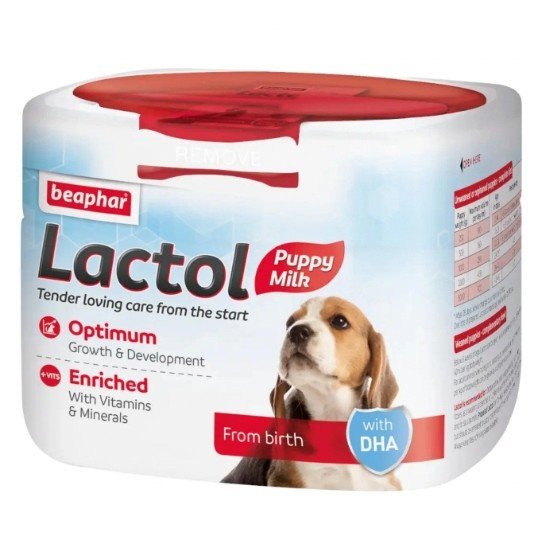 Beaphar Lactol Puppy Milk 250g with a bowl of prepared puppy milk and measuring scoop.